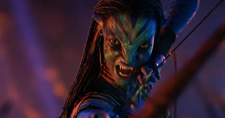 Na’vi warrior aiming a bow in Avatar: Fire and Ash, releasing in theaters December 19, 2025.
