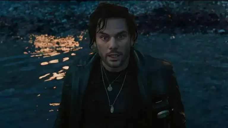 Jeremy Irvine as James Sunderland emerging from the water in Return to Silent Hill teaser trailer.